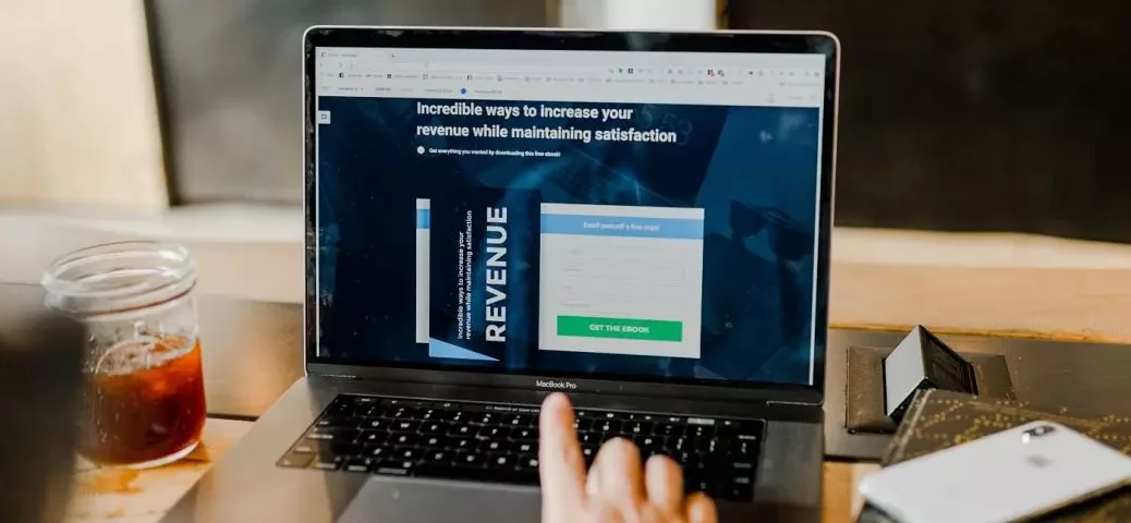 website about revenue open on laptop