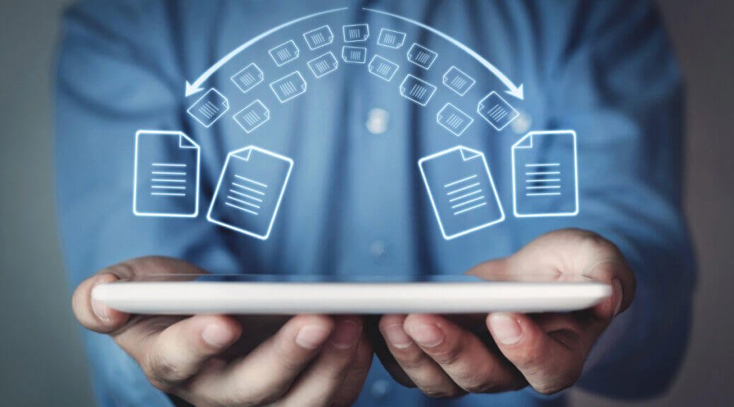 man holding a tablet in hands