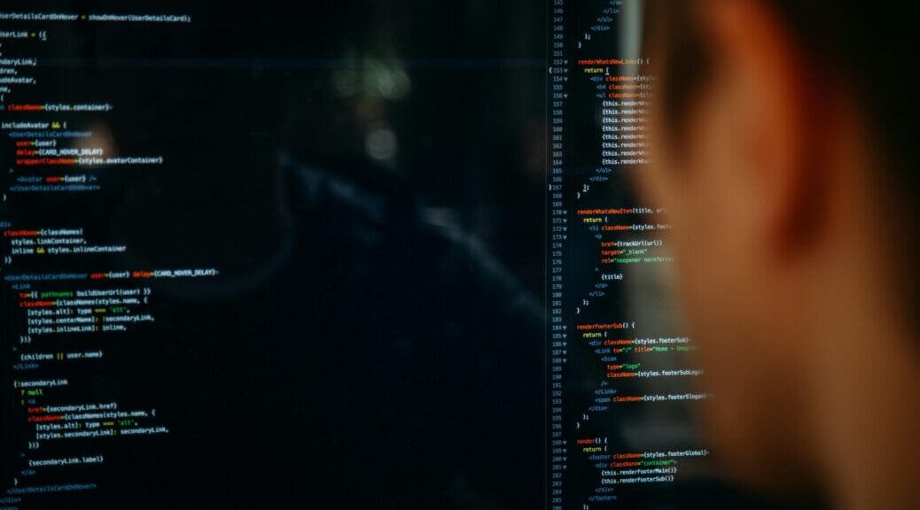 person facing computer desktop