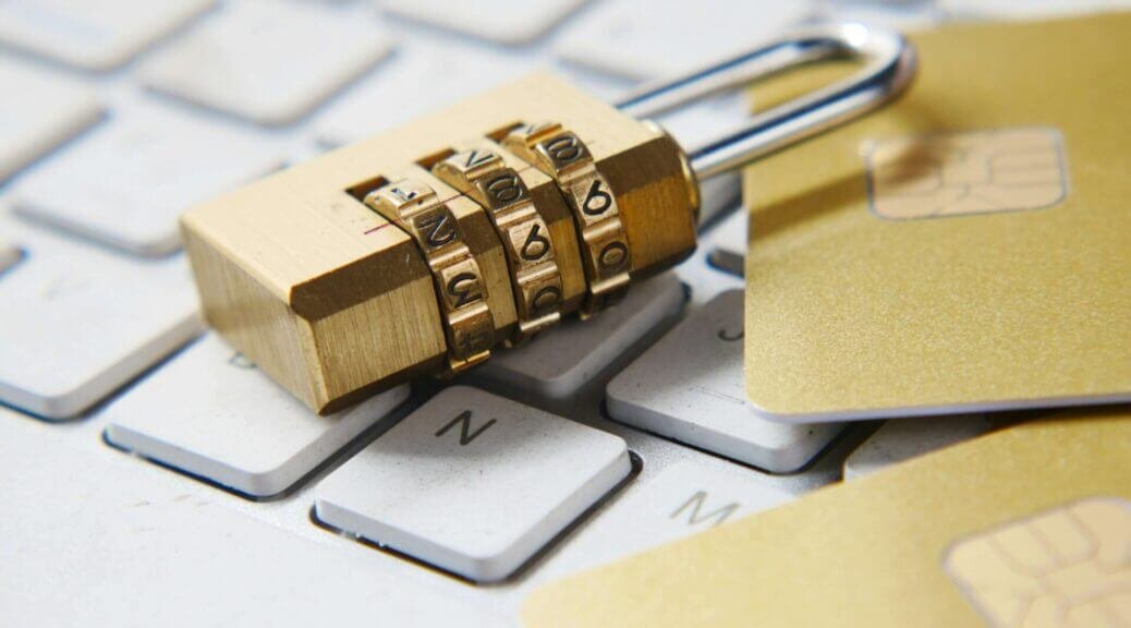 a keylock and sim cards on a keyboard